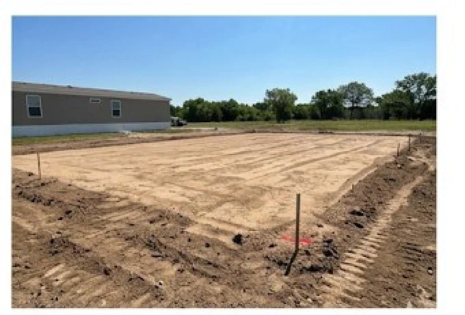 Leveled dirt pad prepared for a mobile home in Lavaca County